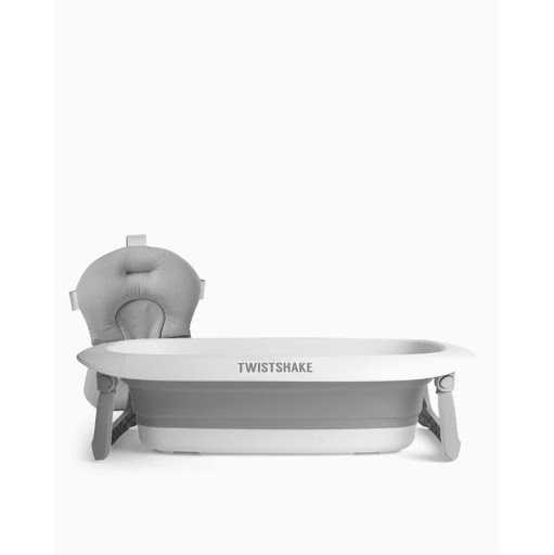 BAÑERA Y COJÍN  TWISTSHAKE GRIS PASTEL  TWISTSHAKE  UNIDAD x 1 UND Un set de iniciación perfecto para el primer baño de su hijo. Con la bañera plegable y la suave y cómoda almohada de baño de Twistshake, incluso los bebés más pequeños podrán pasar un maravilloso baño