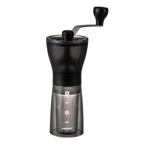 Molino de Café Manual Hario Mini Slim – Ajuste de Molienda, Compacto y Portátil Hario  Caja  x 1 Con su tamaño compacto y portátil, es perfecto para los amantes del café que buscan disfrutar de una taza de café recién molido en cualquier momento y lugar.