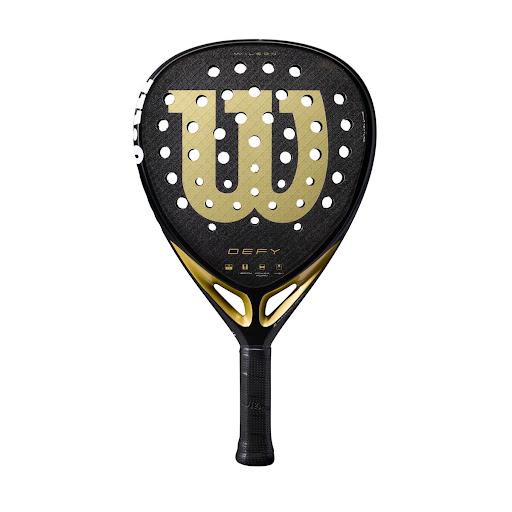 Pala de Padel Wilson Defy V1 Wilson Papeleta x 1 Pala de Padel Wilson Defy V1:Descubre la elección perfecta para jugadores avanzados y profesionales que buscan potencia y agilidad en cada golpe. Esta raqueta está diseñada para ofrecer un rendimiento