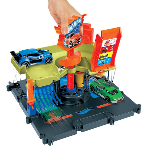 Hot Wheels City Autolavado De La Ciudad Hot Wheels  x 1 Es un set interactivo que incluye una estación de lavado de autos con efectos sorprendentes. Presenta un sistema que cambia el color de los vehículos cuando interactúan con el agua y múltiples áreas d