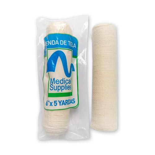 VENDA GASA TELA 6X5 (PAQ X2) MEDSUP 0 x 2 Venda de gasa tejida de 6 pulgadas por 5 yardas, fabricada en hilaza de algodón crudo. Es liviana, suave, libre de partículas extrañas y de color piel claro. Se utiliza para fijar apósitos, inmoviliza