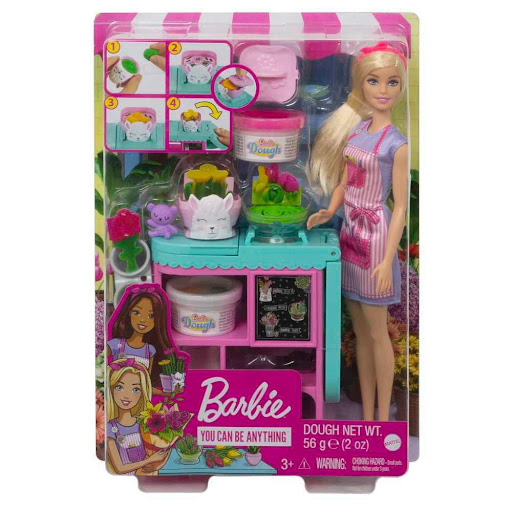 Barbie Tienda De Flores Barbie  x 1 El Barbie Tienda de Flores es el set perfecto para los niños que sueñan con diseñar hermosos arreglos florales. Con su estación de creación de flores, moldes y masa especial, podrán explorar su creati