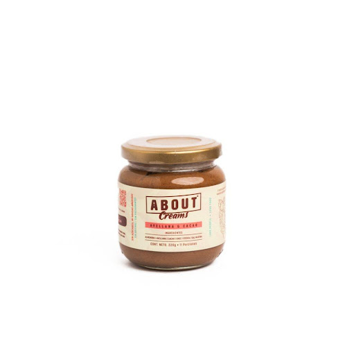 Crema Avellana & cacao ABOUT Envase de vidrio x 1 und Crema untable de avellana, almendra y cacao, 100% natural. Textura suave, sabor intenso y chocolatoso, hecha solo con ingredientes naturales. Sin aceites añadidos, sin azúcares añadidos ni aditivos ar