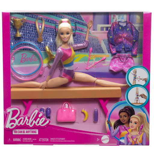 Muñeca Barbie Profesiones Gimnasta Cabello Rubio Barbie  x 1 La Barbie Profesiones Gimnasta Cabello Rubio es ideal para los niños que sueñan con realizar impresionantes rutinas de gimnasia. Con su propia viga de equilibrio y más de 10 accesorios temáticos, podr