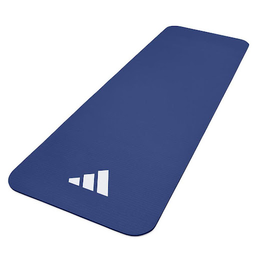 Colchoneta Deportiva ADIDAS Azul 10 mm ADIDAS Individual x 1 Lleva tu entrenamiento al siguiente nivel con la colchoneta fitness Mat Adidas de 10 mm Azul, su diseño suave y acolchado, combinado con una base acanalada, te brinda estabilidad y tracción para una m