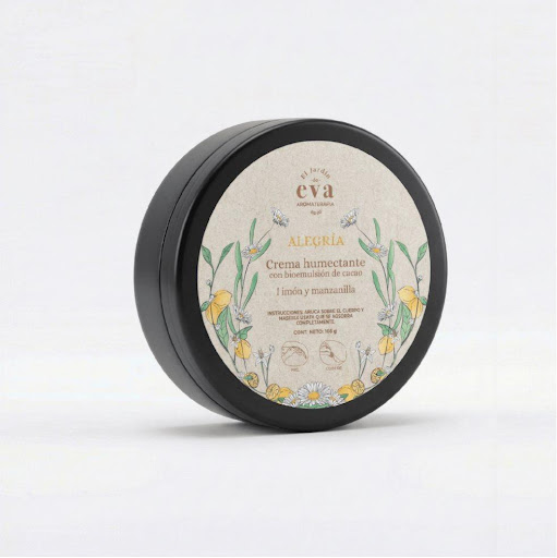 Crema humectante Alegría con bioemulsión de cacao aceites esenciales de limón y manzanilla x 165 ml El Jardín de Eva pote x 1 La Crema Humectante Alegría combina la nutrición de la bioemulsión de cacao con aceites esenciales de limón y manzanilla, creando una experiencia corporal que hidrata la piel mientras acompaña una sen