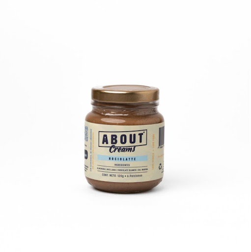 Crema Nocciolatte 120g ABOUT Envase de vidrio x 1 Crema untable Nocciolatte: almendra y avellana con chocolate blanco sin azúcar. Natural, ultra cremosa y elaborada con ingredientes reales. Endulzada con alulosa y eritritol, sin azúcares ni grasas añ