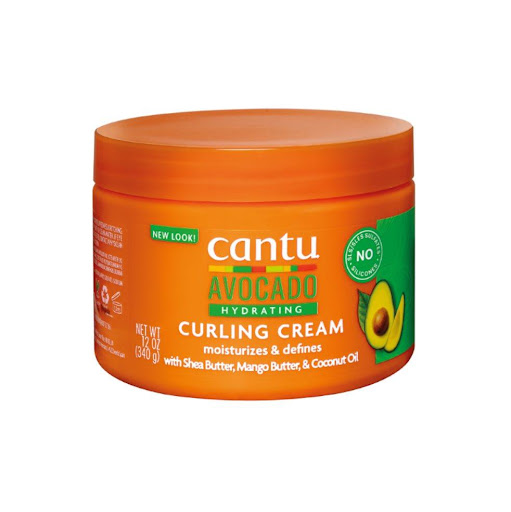 Cantu Avocado Curling Cream Cantu  x 1 Crema de peinado rica y nutritiva que ayuda a definir y controlar los rizos, aportando hidratación y brillo. Formulada con aceite de aguacate y manteca de karité pura, esta crema crea una definición d